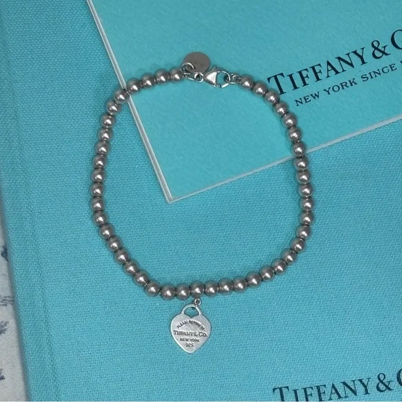 Authentic Tiffany & Co 4mm Bead Bracelet w/ Silver Mini Heart Charm - Picture 2 of 10